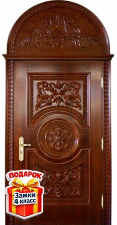 Металлическая парадная дверь арочного типа с массивом и резьбой